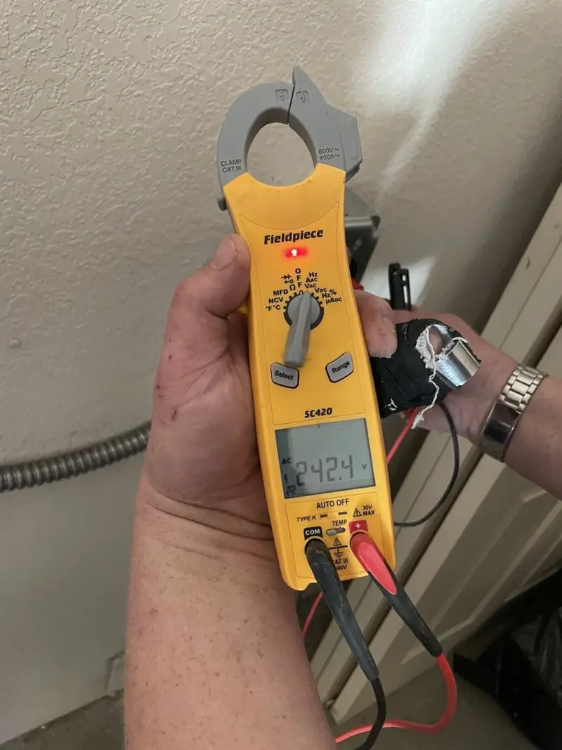 Voltage testing with clamp meter during Electrical Installation Services in The Dalles